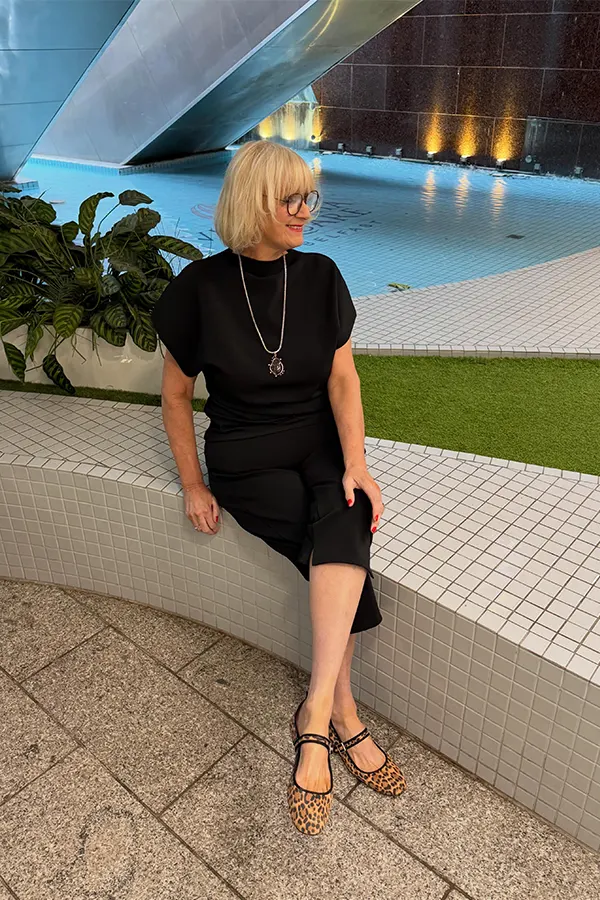Black Short Sleeve Top With Midi Skirt For A Slim Streamlined Shape