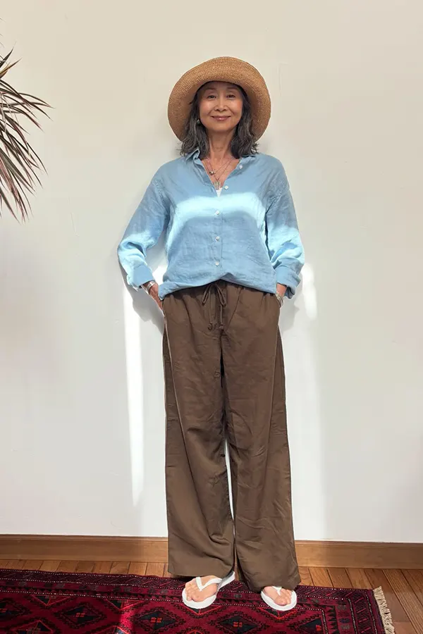 Black Sleeveless Top With Rust Colored Pants