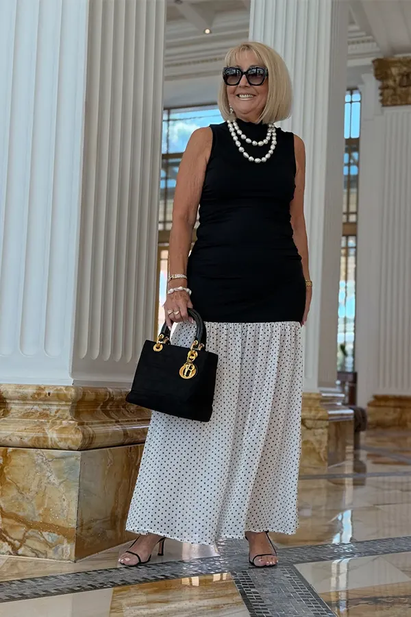 Black Sleeveless Top With Wide Patterned Skirt