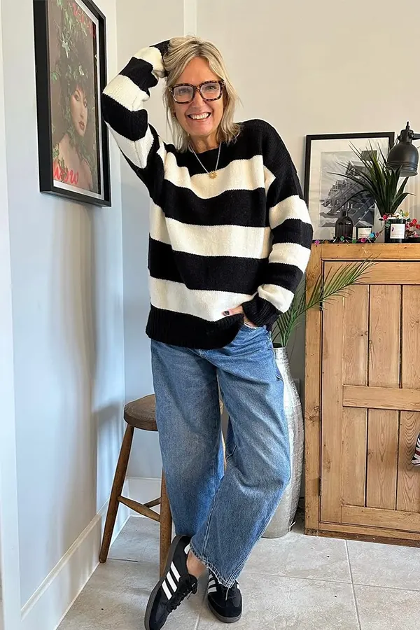 Bold Striped Sweater With Relaxed Blue Jeans