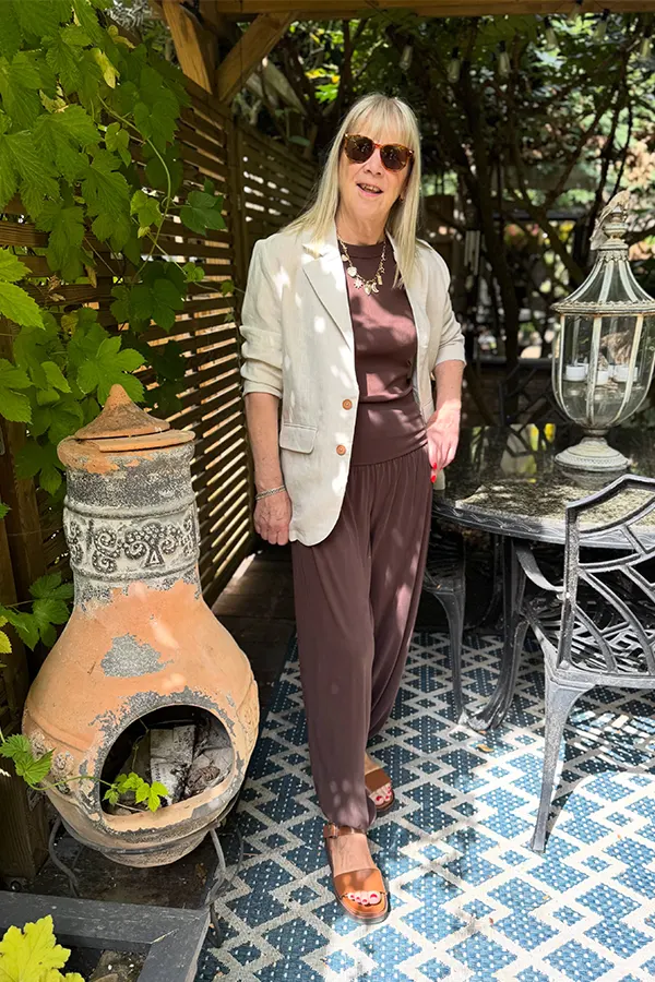 Brown Linen Trousers With A Light Jacket