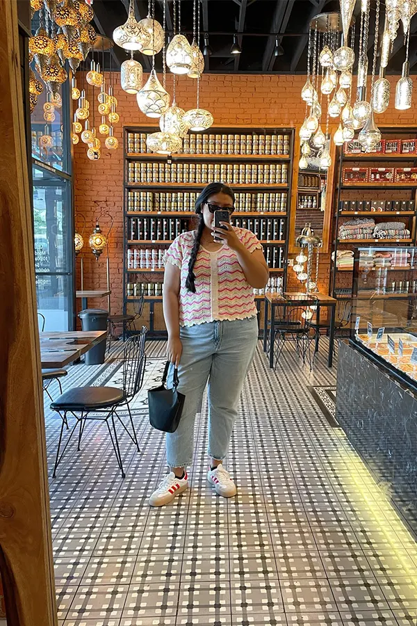 Casual Denim Jacket With Neutral Pants And Sneakers