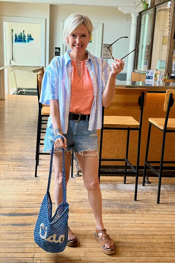 Coral Top And Denim Shorts With A Lightweight Layer