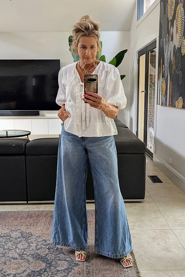 Crisp White Blouse With Wide Leg Soft Blue Jeans