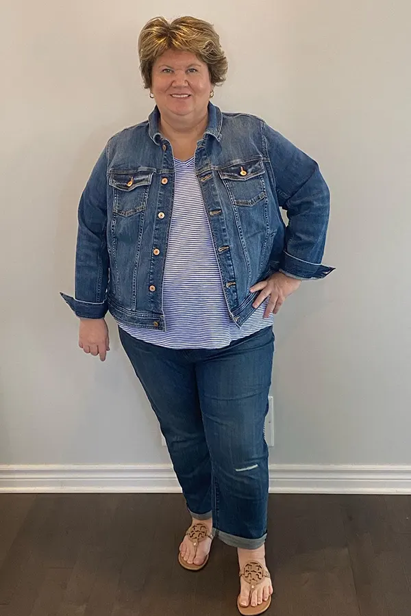 Denim Jacket With Striped Top And Cropped Jeans For A Casual Layered Outfit
