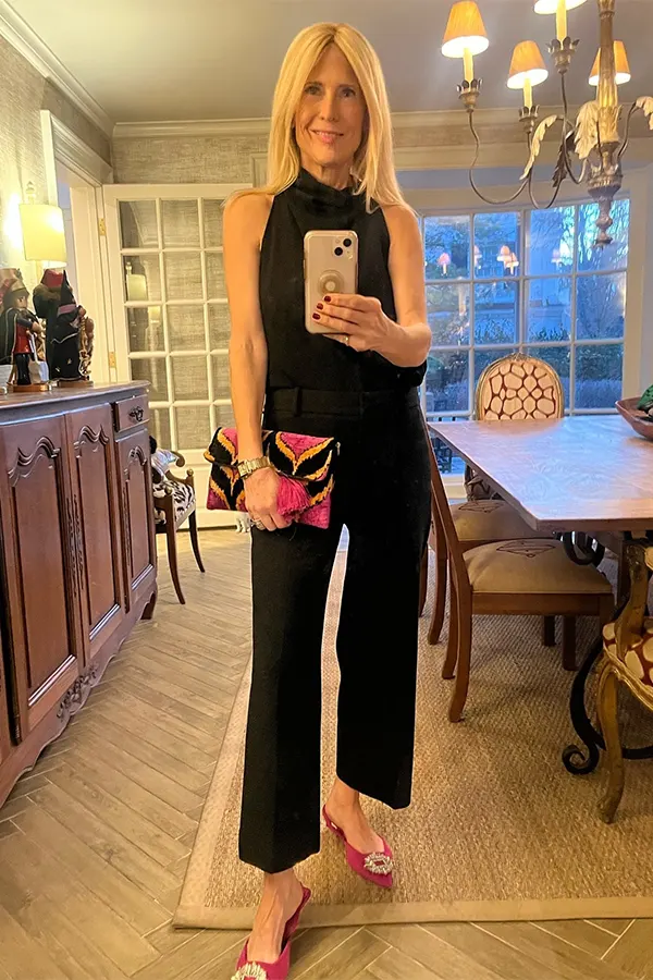Dress Up Wide Leg Black Pants With A Colorful Clutch