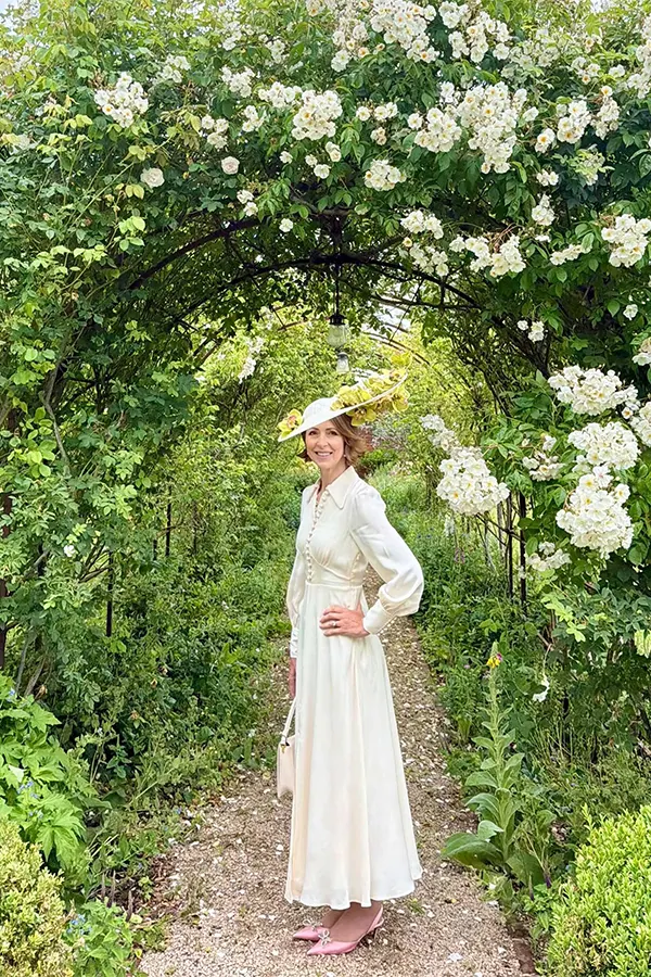 Keep A White Midi Dress Feminine With A Wide Brim Hat