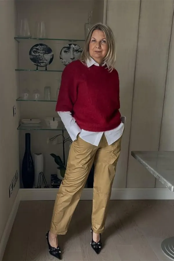 Layer A Burgundy Sweater Over A Crisp White Shirt