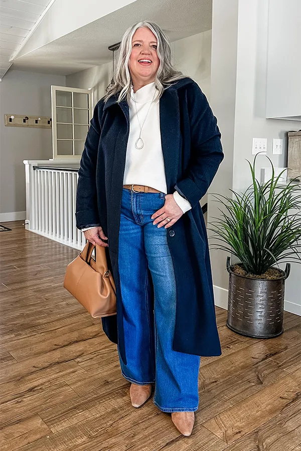 Navy Long Coat With White Top And Blue Denim
