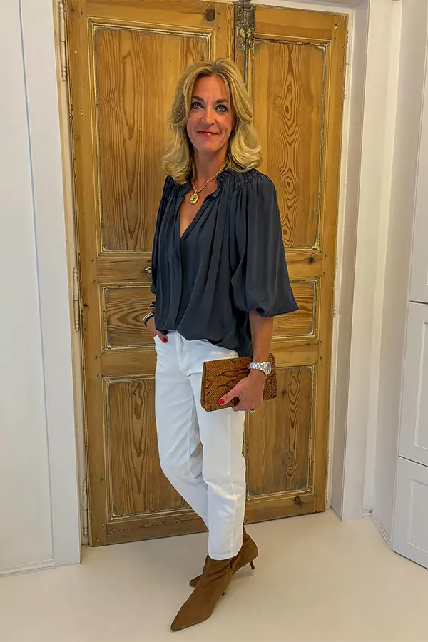 Pair A Charcoal Draped Blouse With White Pants