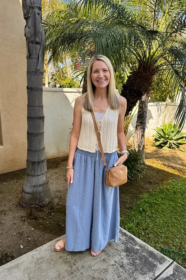 Sleeveless Top With Flowing Blue Trousers