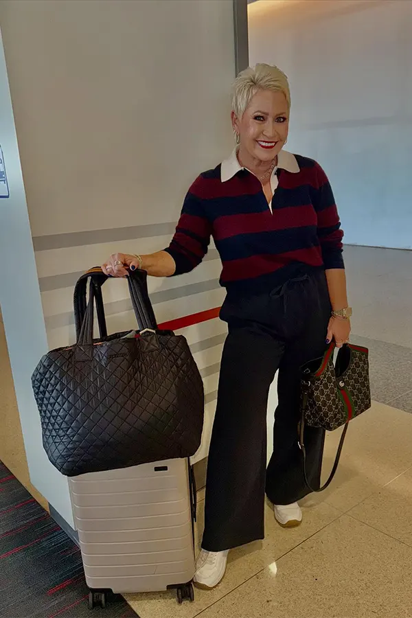Striped Sweater With Black Pants For Cold Weather Travel