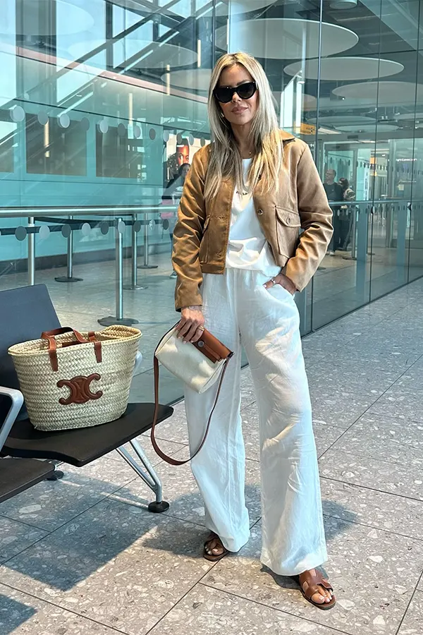 Tan Jacket With White Layers For A Fresh Travel Look
