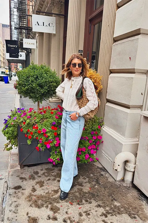White Cardigan With A Floral Top And Light Wash Jeans