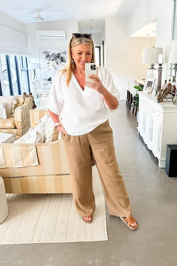 White Relaxed Blouse With Wide Leg Beige Pants For A Balanced Short Frame