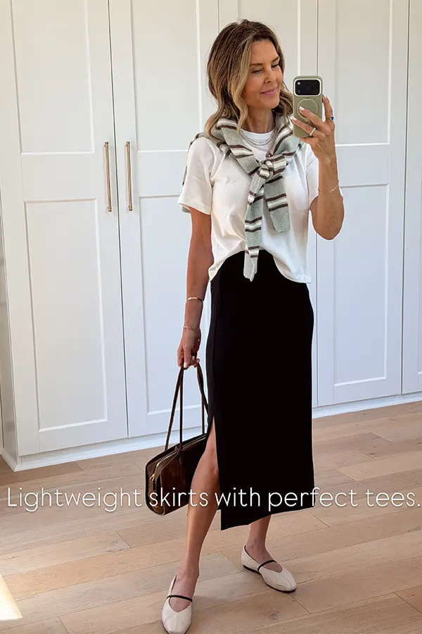 White Tee And Black Midi Skirt With A Draped Scarf