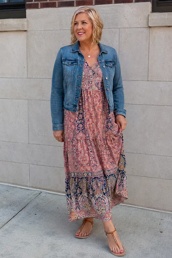 A Floral Midi Dress Layered With A Denim Jacket