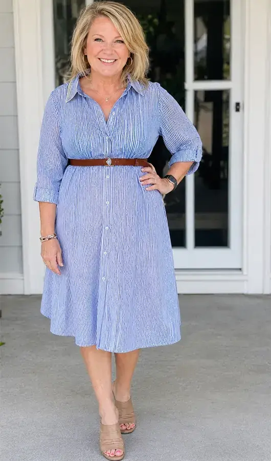 A Light Blue Belted Shirt Dress With A Soft Print