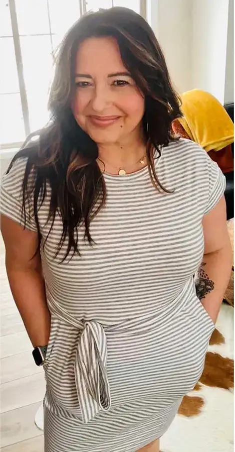 A Striped Wrap Style Top With A Side Tie