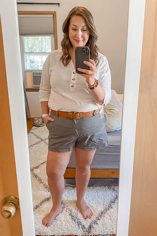 A White Button Front Top With Gray Denim Shorts