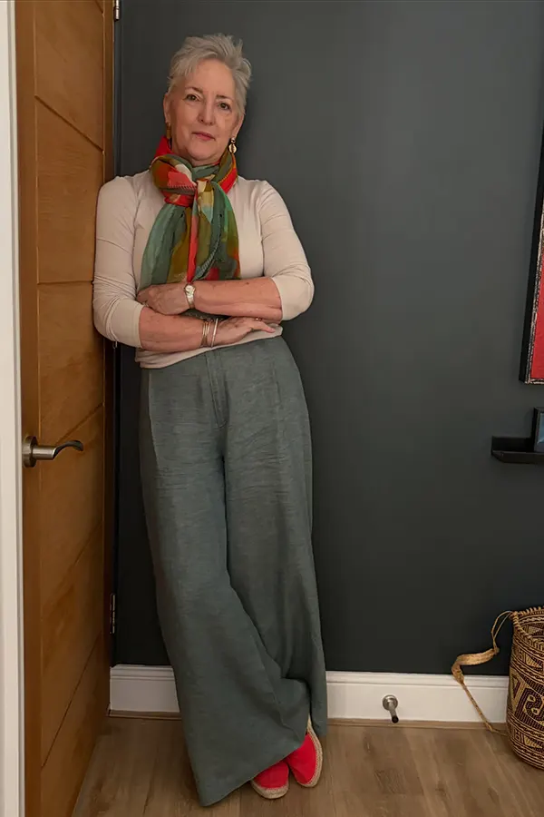 Add A Colorful Scarf To Wide Gray Trousers