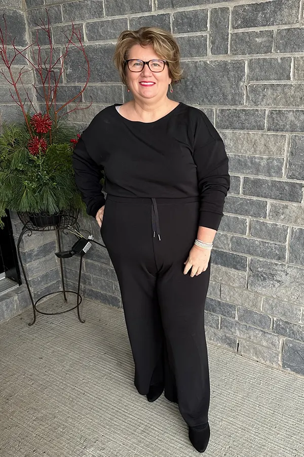 All Black Jumpsuit With A Simple Streamlined Shape