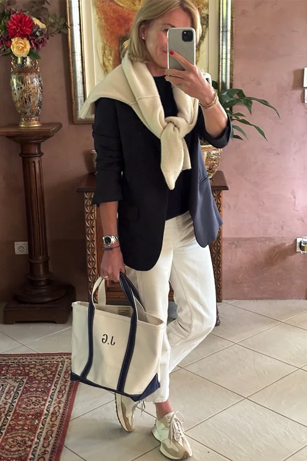 Black Blazer With A Draped Sweater And Cream Pants