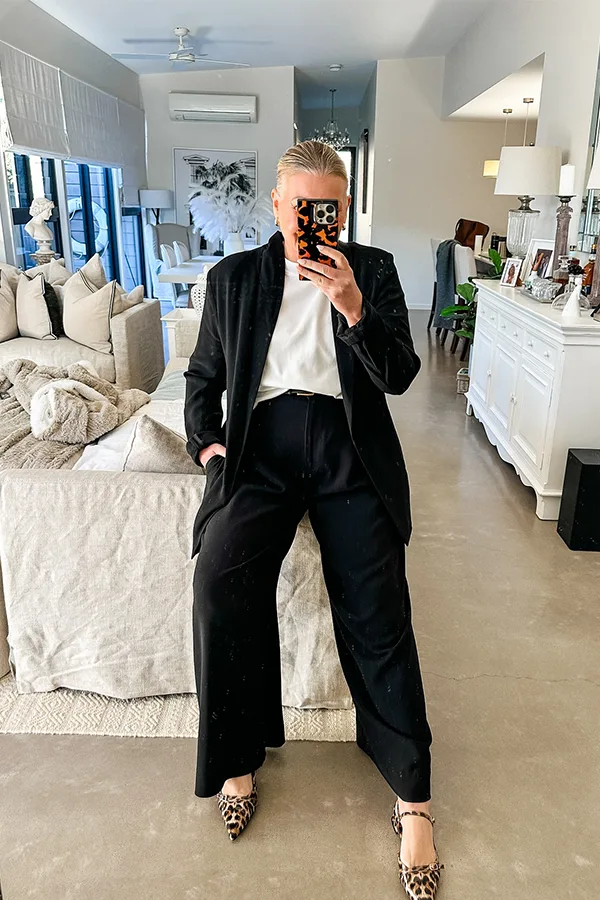 Black Blazer With Wide Leg Trousers And A White Top