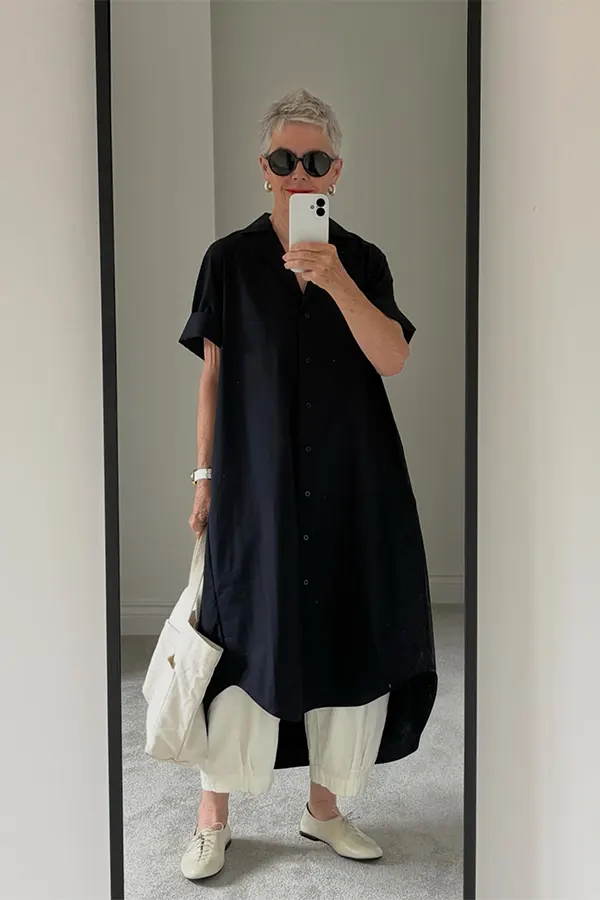 Black Midi Dress With White Pants For Modern Layering