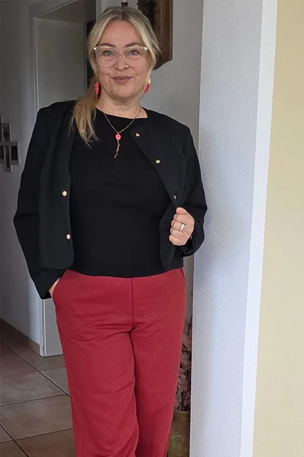 Black Top With Red Pants And Simple Flats