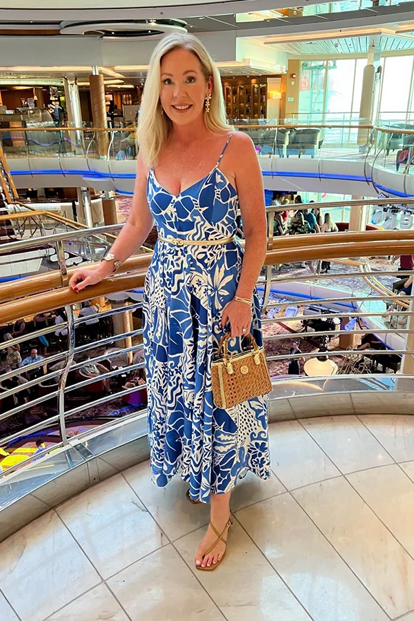 Blue Printed Jumpsuit With A Woven Bag