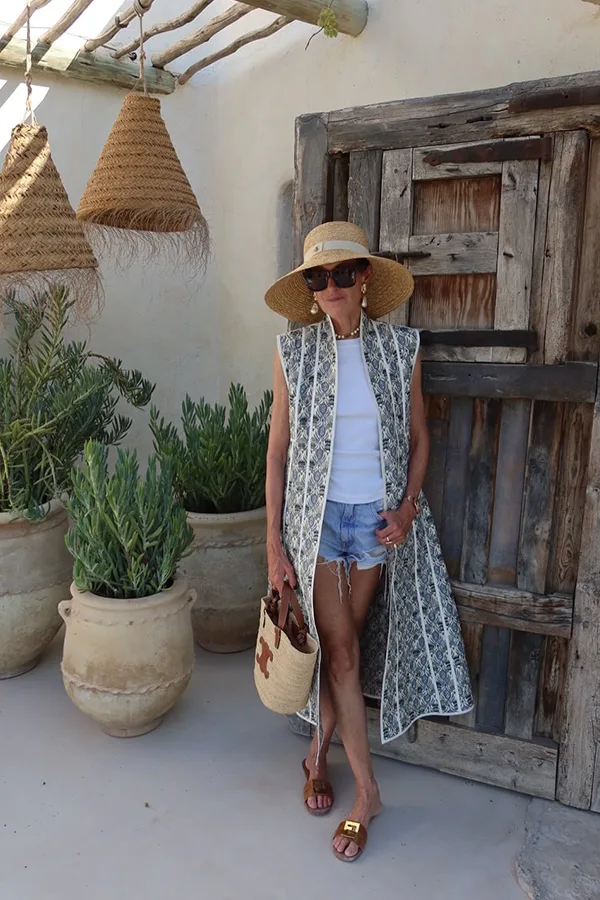 Breezy Shorts Outfit With A Straw Hat