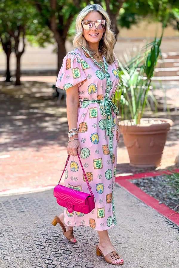 Choose A Playful Pink Printed Dress With Matching Accessories