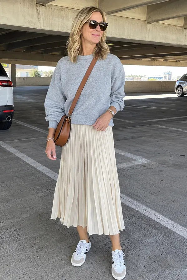 Gray Sweater With A Pleated Midi Skirt And Sneakers