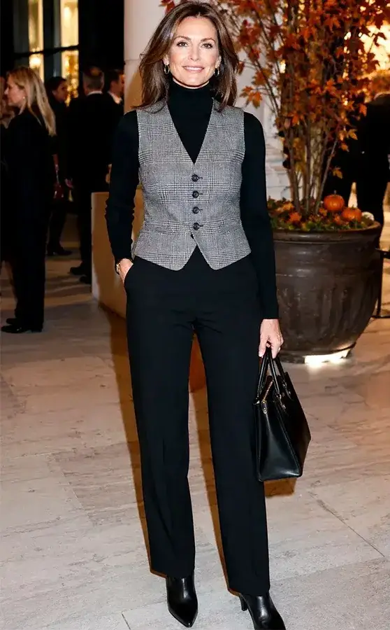 Gray Tailored Vest With A Black Turtleneck