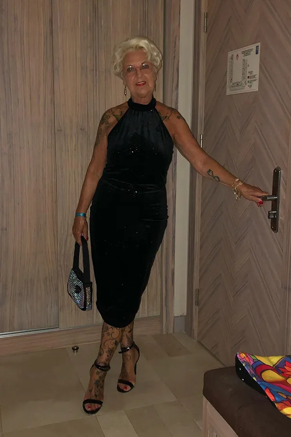 Keep It Elegant In A Sleek Black Halter Midi Dress