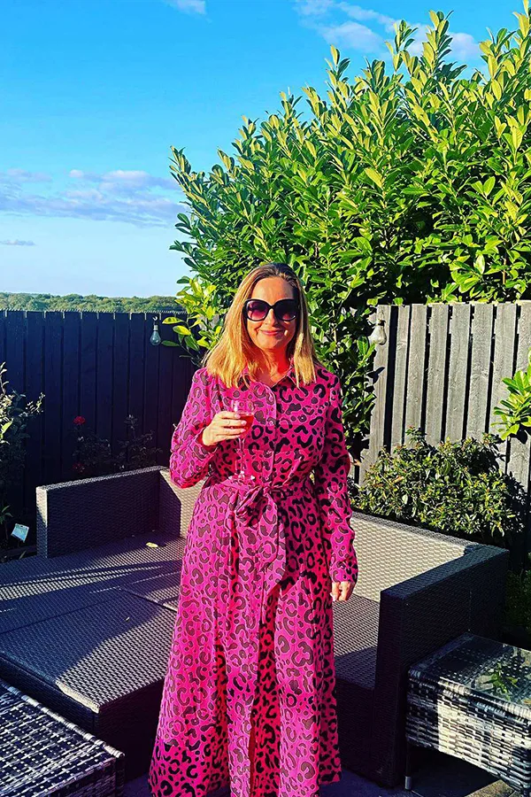 Make A Bold Entrance In A Bright Pink Printed Dress
