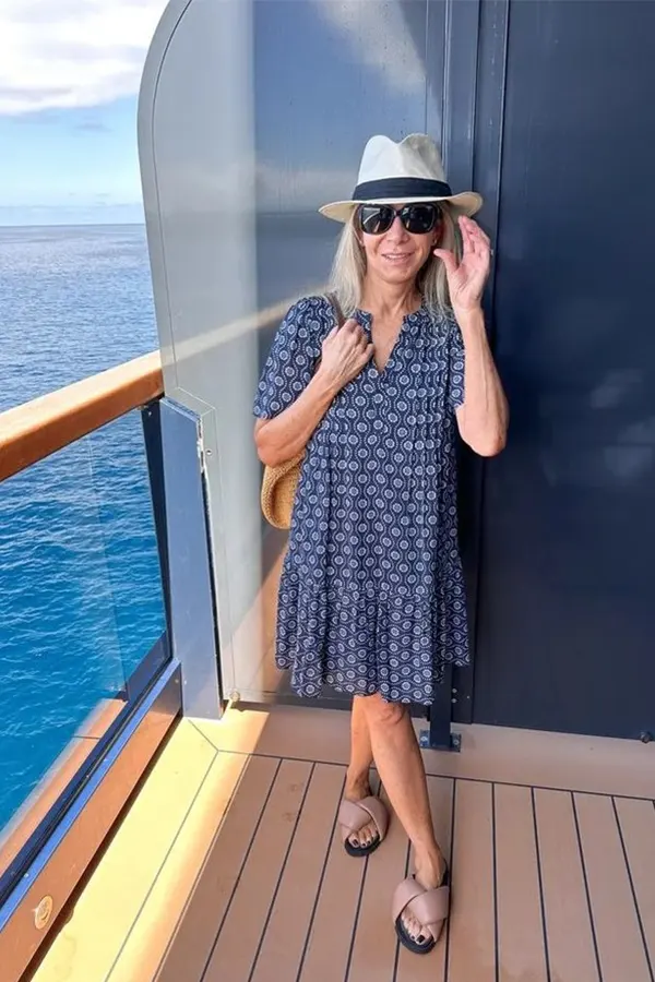 Navy Patterned Dress With A Wide Brim Hat