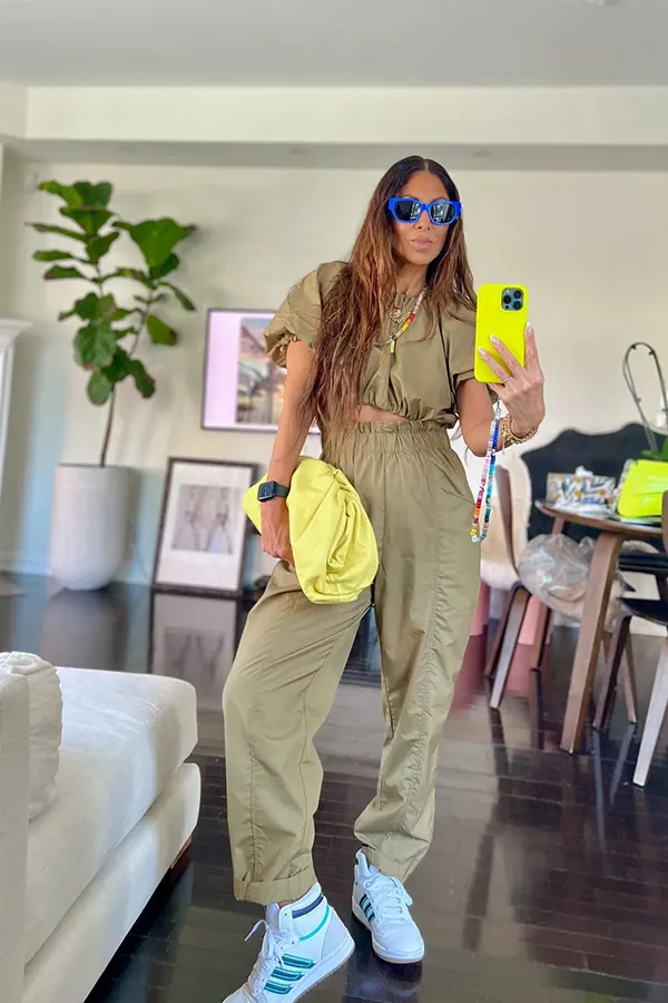 Olive Utility Jumpsuit With Sporty Sneakers
