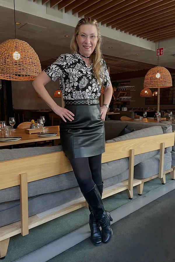 Pair A Patterned Black Top With A Leather Mini Skirt