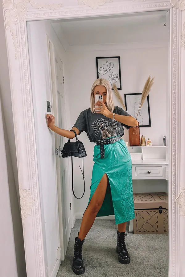 Pair A Teal Midi Skirt With A Patterned Top And Ankle Boots