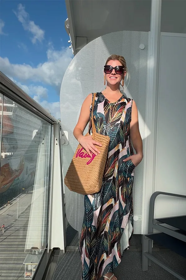 Patterned Maxi Dress With A Straw Tote And Sunglasses
