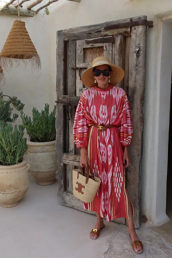 Red Printed Maxi Dress With A Wide Brim Hat