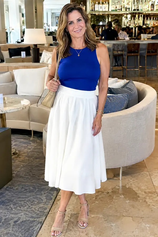 Royal Blue Top With A Full White Midi Skirt