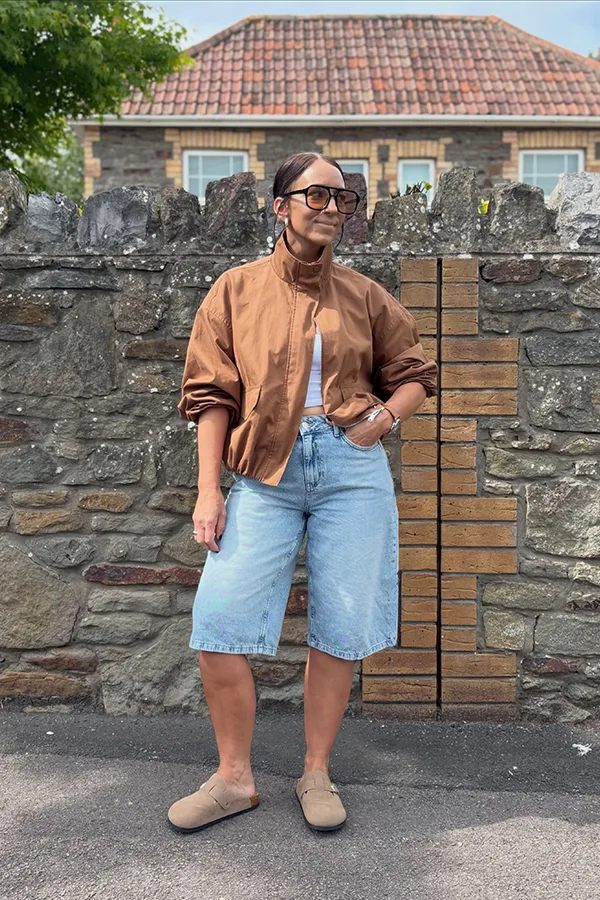 Rust Colored Top With Light Denim Jorts For Warm Contrast