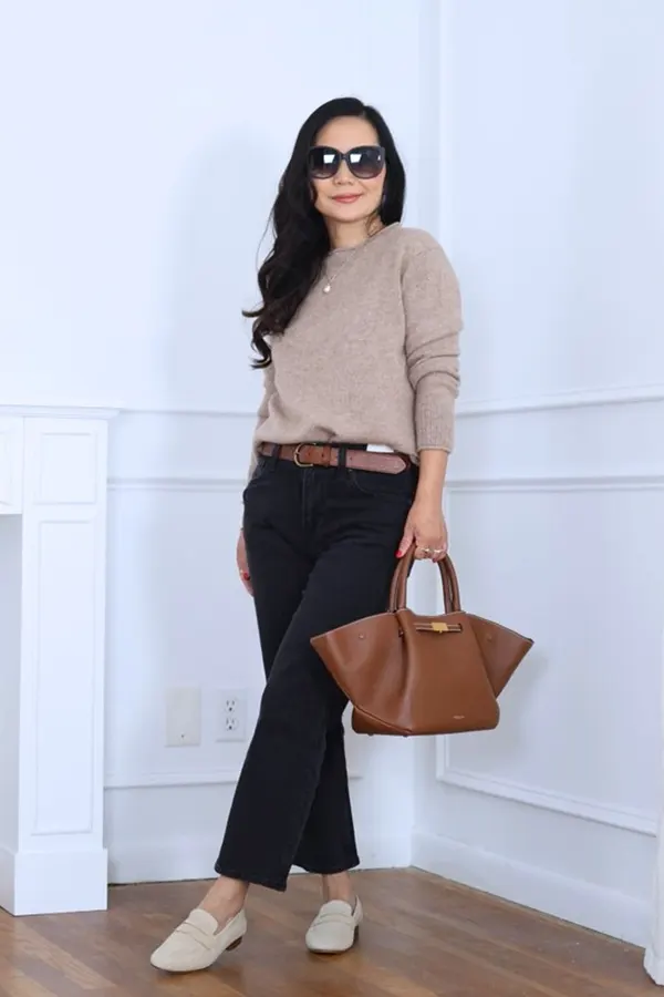Taupe Sweater Black Pants And A Structured Brown Bag