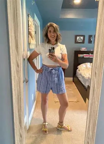 White Crop Top With Striped Shorts For A Relaxed Summer Look