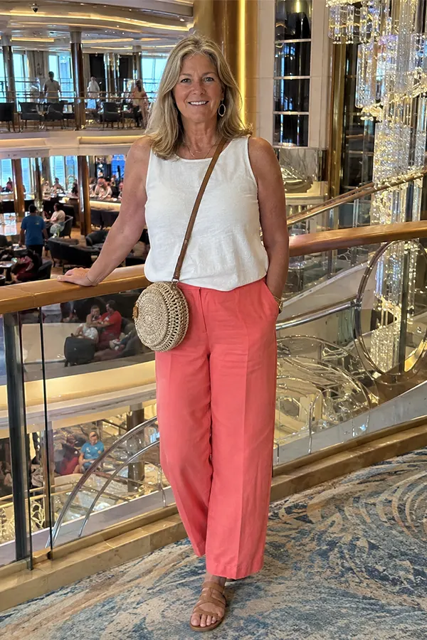 White Top And Coral Pants For A Bright Daytime Look