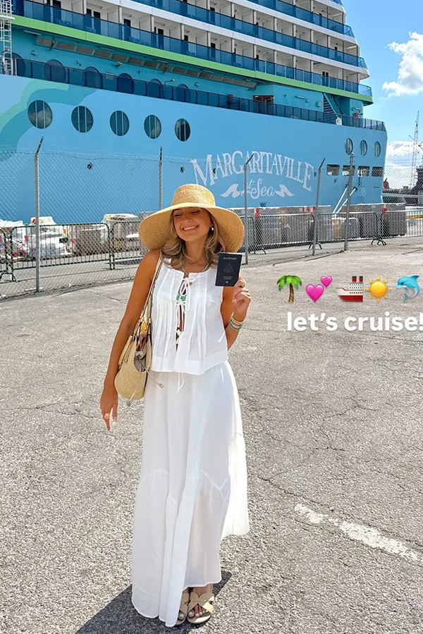 White Wide Leg Pants With A Straw Hat For Port Day
