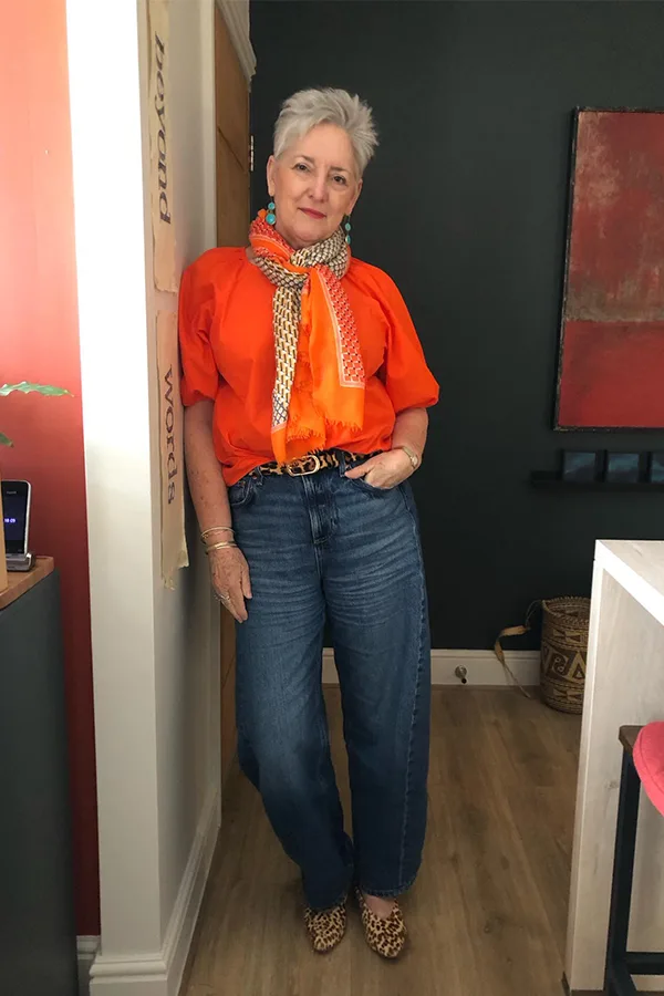 Bright Orange Blouse With A Printed Neck Scarf